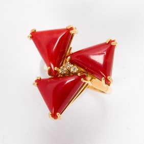 A coral, diamond, and 18k gold ring