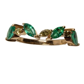 An emerald, diamond, and 18k gold ring