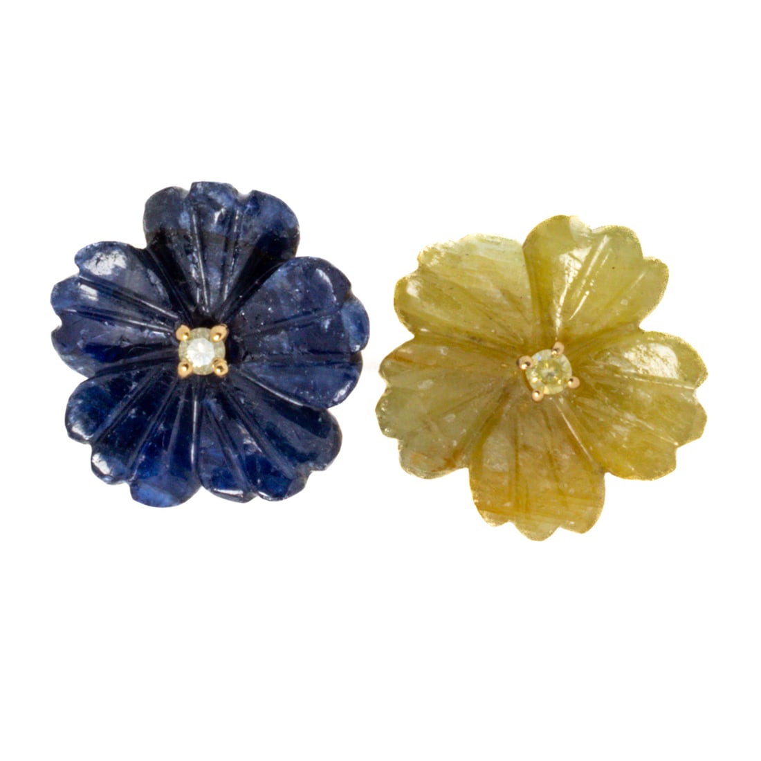 A pair of sapphire and diamond earrings: A pair of sapphire and diamond earrings Designed as flowers, one blue and one yellow, each centering a round brilliant-cut diamond; total sapphire weight: 11.40 carats; 3.55 grams; 1/2 in