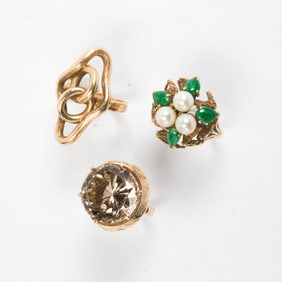 Three gemstone gold rings
