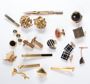 Group of gold-tone men's accessories
