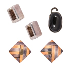 A group of silver and gold jewelry