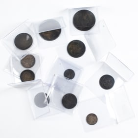 A group of Kingdom of Hawaii 1883 coins