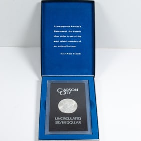 An 1884 CC (Carson City) GSA uncirculated silver dollar in presentation box