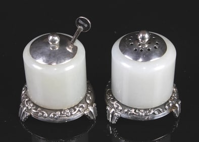 A pair of Asian silver mounted hardstone stone salt and peppers