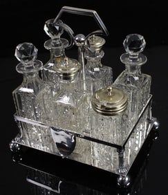 An English silverplate and glass cruet set