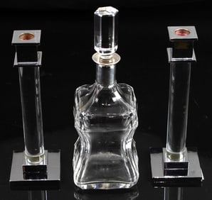 A cut glass decanter with 800 standard silver mount