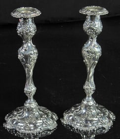 A pair of of English Sheffield, Henry Wilkinson & Co silverplate candlesticks
