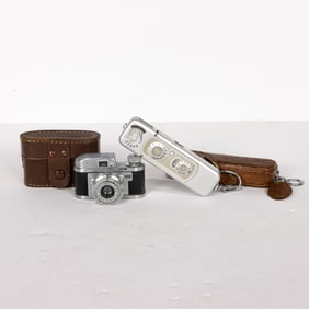 Two miniature cameras in leather cases, the first Rubix 16mm camera; the second Minox B subminiature