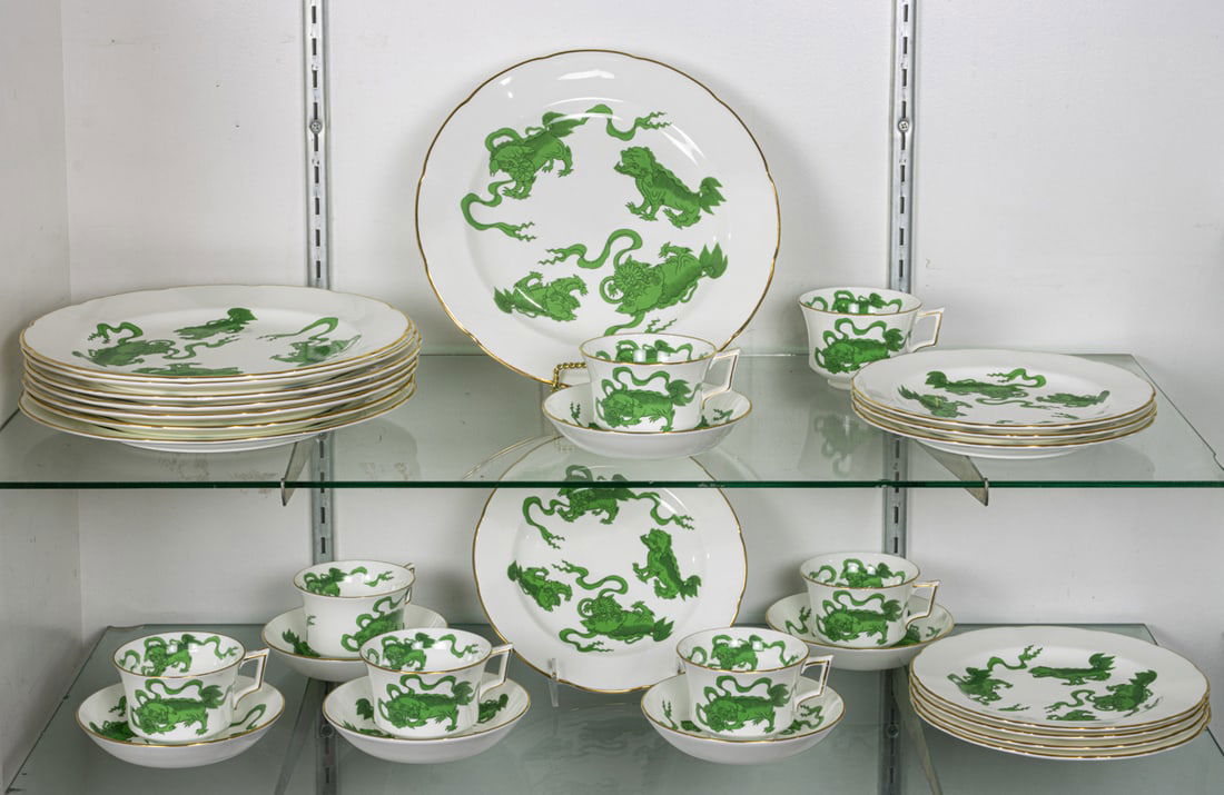A Wedgwood for porcelain partial dinner service in the Chinese Tigers pattern: A Wedgwood for porcelain partial dinner service in the Chinese Tigers pattern, comprising (8) dinner plates, 11" dia; (8) salad plates, 8.25"dia; (7) tea cups, 2.5"h; (6) saucers, 5.75"dia [29 total]