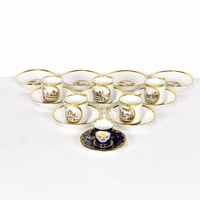 A group of Continental porcelain demitasse cups and saucers