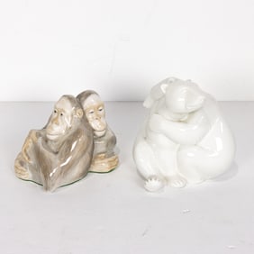 Two porcelain groups of animals