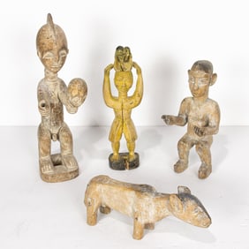 A group of three Akan shrine wood figures