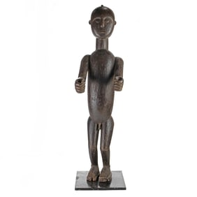 An Akan figure for a drum attendant
