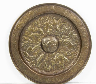 A Belgian repousse copper plaque: The Battle of the Amazons, after a model by Antoine Vechte, marked