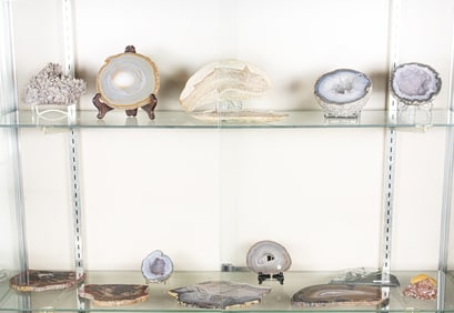A group of specimen stones, including (1) large two piece fish fossil, (2) large blue geodes, (1)