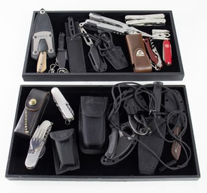 A group of ten multi-tools and ten everyday carry neck knives with sheaths