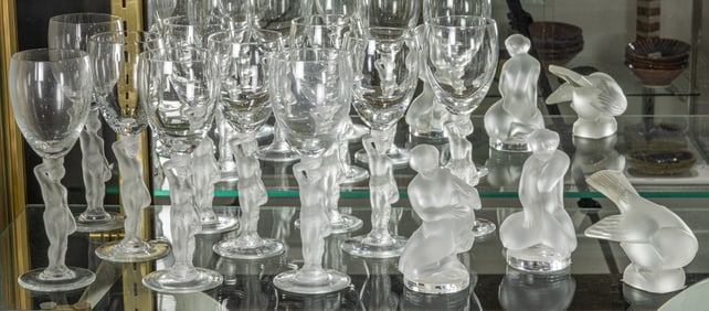 Three Lalique glass figures with ten figural wine glasses