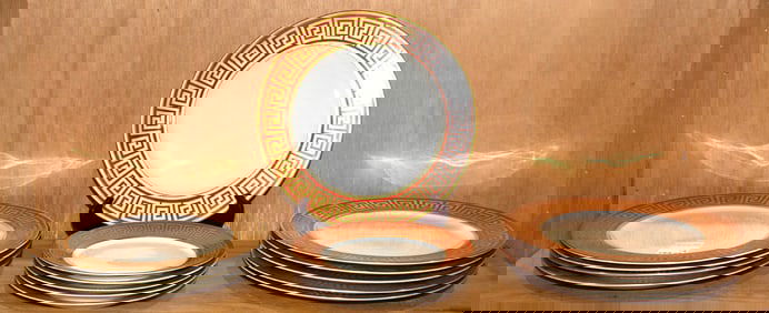 A group of Rosenthal porcelain plates with gilt Greek key borders