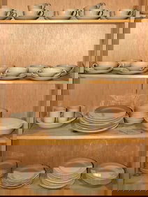 A Wedgwood of Etruria & Barlston Drabware pottery dinner service