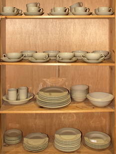 A Wedgwood of Etruria & Barlston Drabware pottery dinner service: A Wedgwood of Etruria & Barlston Drabware pottery dinner service, comprising (6) chargers, 11"dia; (6) dinner plates, 9"dia; (13) salad plates, 8.25"dia; (6) leaf form salad plates, 8"dia; (11) bread