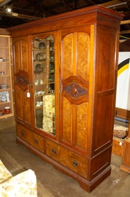 A Victorian style carved wardrobe