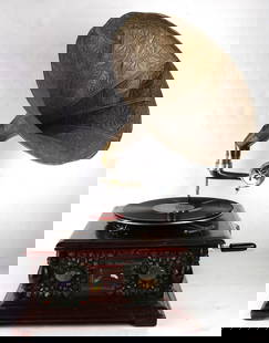 A metal and stone decorated gramophone, Senator Feinstein Estate: A metal and stone decorated gramophone, 7"h x 13"w x 13"d (case). Provenance: The Estate of Senator Dianne Feinstein (1933-2023)