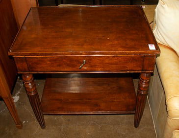 A mahogany side table in the English taste