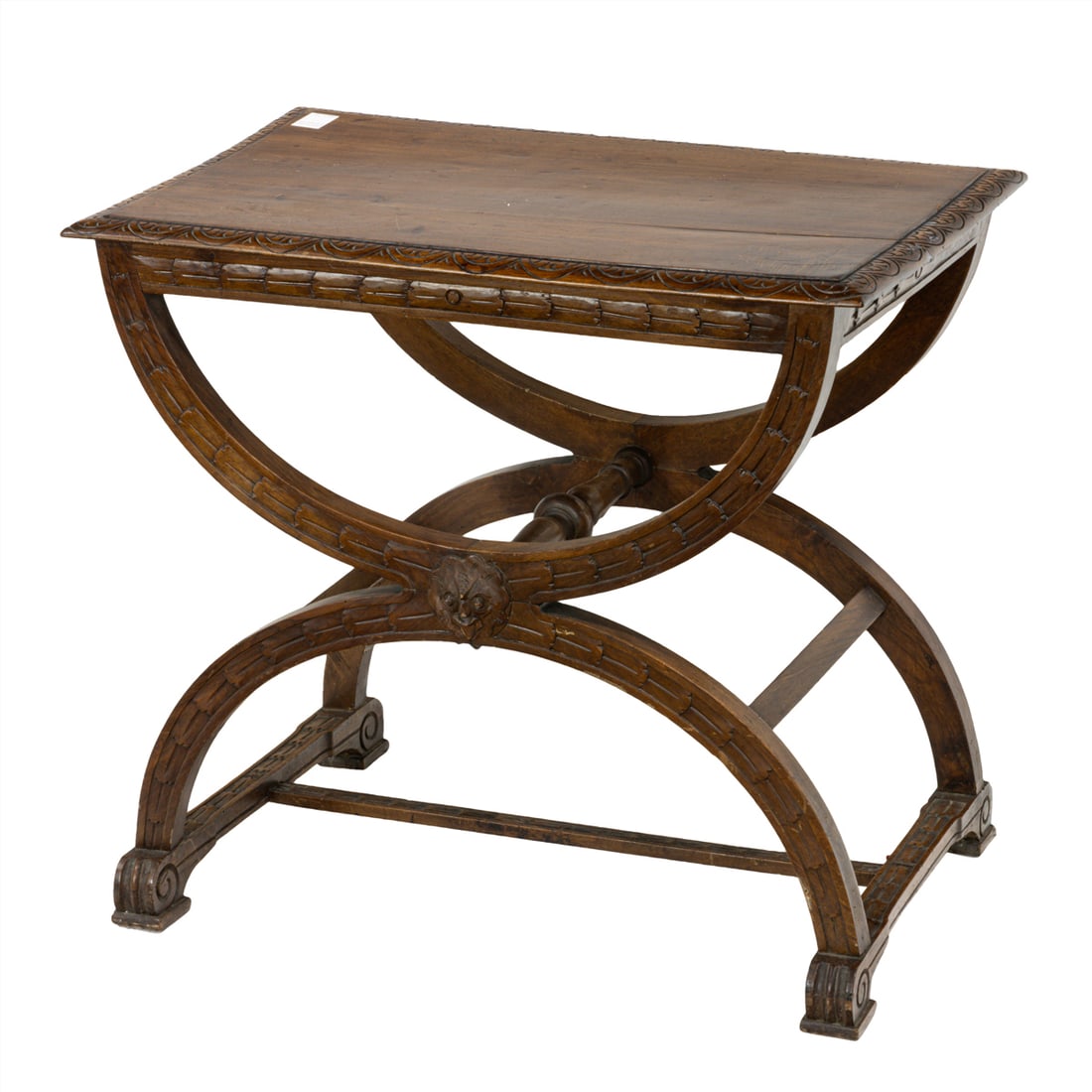 An Italian walnut savonarola table: An Italian walnut savonarola table, early 20th century, the rectangular table top over X-shaped base carved with grotesque mask and ending in scrolled feet, approximately 28?h x 31.5?w x 19.25?d