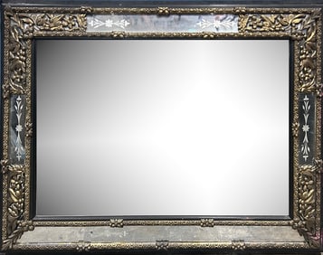 An Italian etched glass mirror