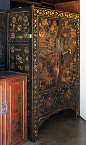 A Chinese black lacquered cabinet