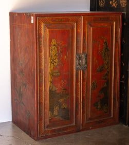 A Chinese red lacquered two-door cabinet