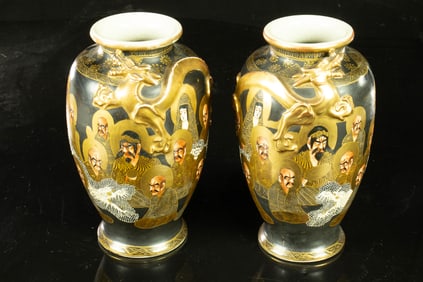 A pair of Japanese Satsuma vases with arhats