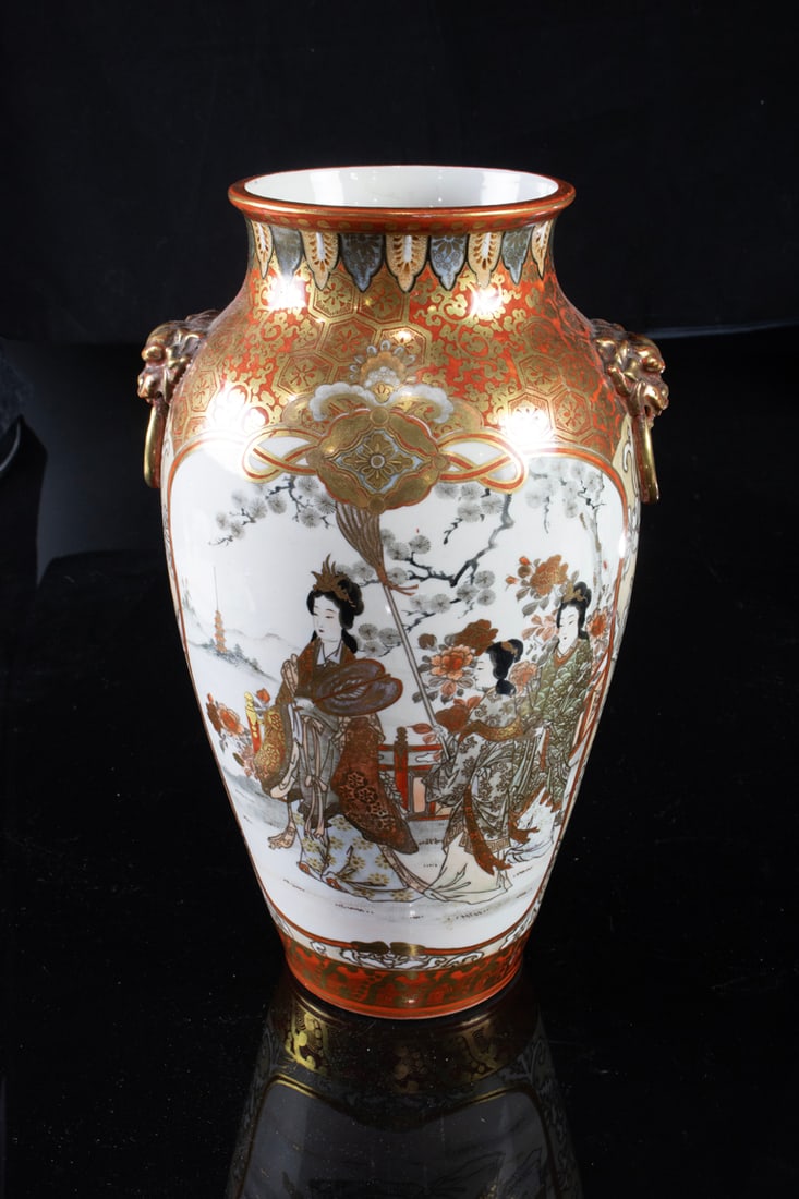 A Japanese Kutani vase: A Japanese Kutani vase. Meiji period, 30.75" high.