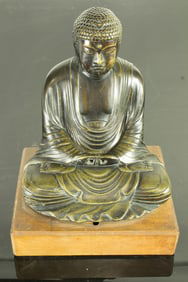 A Japanese bronze figure of Kamakura Buddha