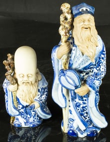 (lot of 2) Japanese blue and white lucky god figures