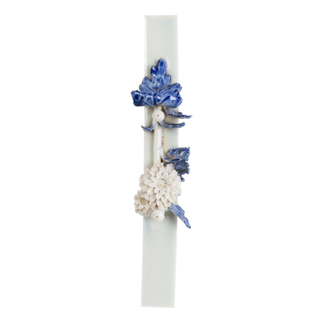 A Hirado brush rest: A Hirado brush rest. Featuring floral design, 6.5" across.