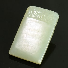 A Chinese celadon jade pendant