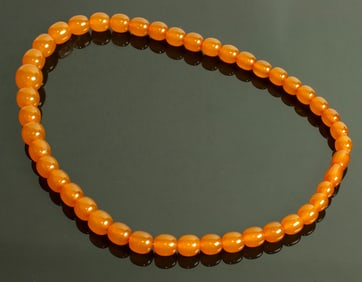A baltic amber graduated bead necklace