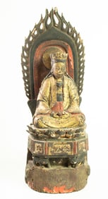 A Chinese gilt lacquered Buddha