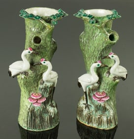 A pair of Chinese green glazed vases
