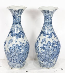 A pair of large Japanese Arita blue and white vases