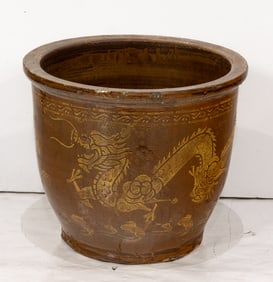 A Chinese bronze glazed 'dragon' planter