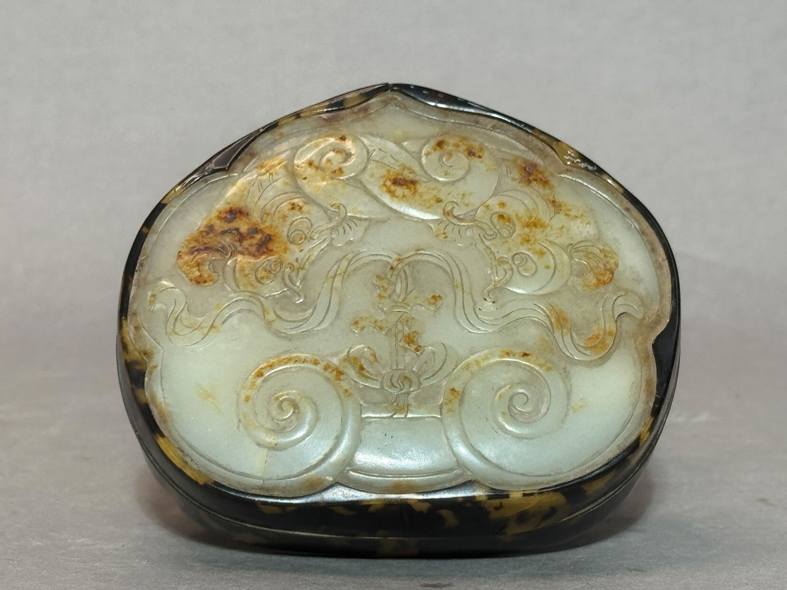 Chinese Jade Box with Catfish Design: Chinese jade box with cat fish design in ruyi head shape, partial golden yellow skin. 5"h x 4"w (12.7 x 10.16 cm) NOTE: THIS ITEM IS IN NEW YORK, WHERE IT CAN BE SHIPPED FROM.