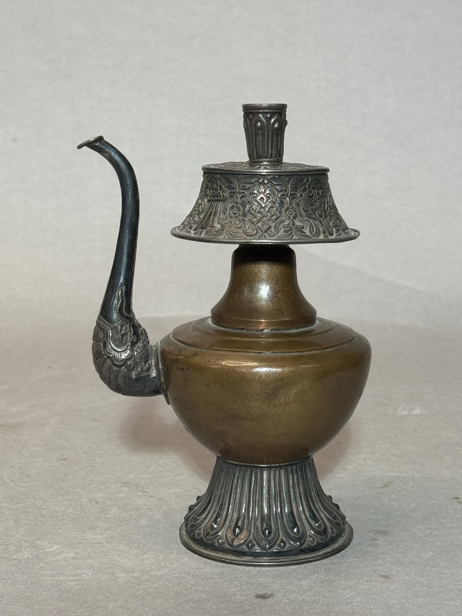 Tibetan Copper and Silver Ceremonial Ewer with Dragon Spout: Tibetan antique copper and silver ceremonial ewer with fine detailed chasing of precious object, dragon spout for the imperial court. Ewer: 6.75"h (17.15 cm) NOTE: THIS ITEM IS IN NEW YORK, WHERE IT C