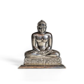 A Sliver Statue of a Seated Buddha