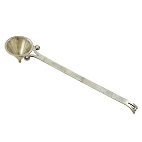 A Mexican Sanborn sterling candle snuffer