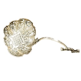 A George III silver tea strainer, possibly Philip Norman