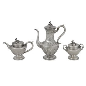 A three piece sterling silver hollowware service