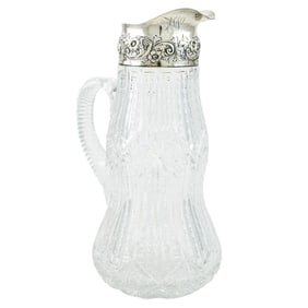 A Dominick & Haff sterling mounted cut glass claret jug